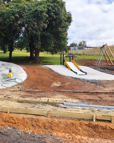 The hill slides and connecting footpaths are underway