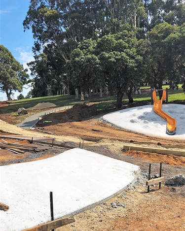 The hill slides and connecting footpaths are underway