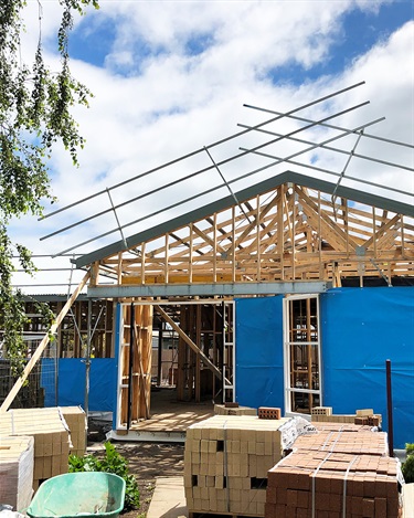 With the frame and roof now complete, brickwork and the internal fit-out will soon begin