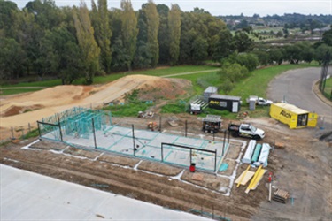 Netball Court foundation has been poured and pavilion frame is underway