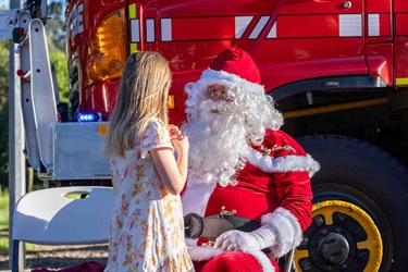 Santa with excited local Imogen Ryan.